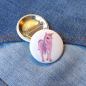Preview: Ansteckbutton Rosa Glitzer-Einhorn auf Jeans mit Rückseite